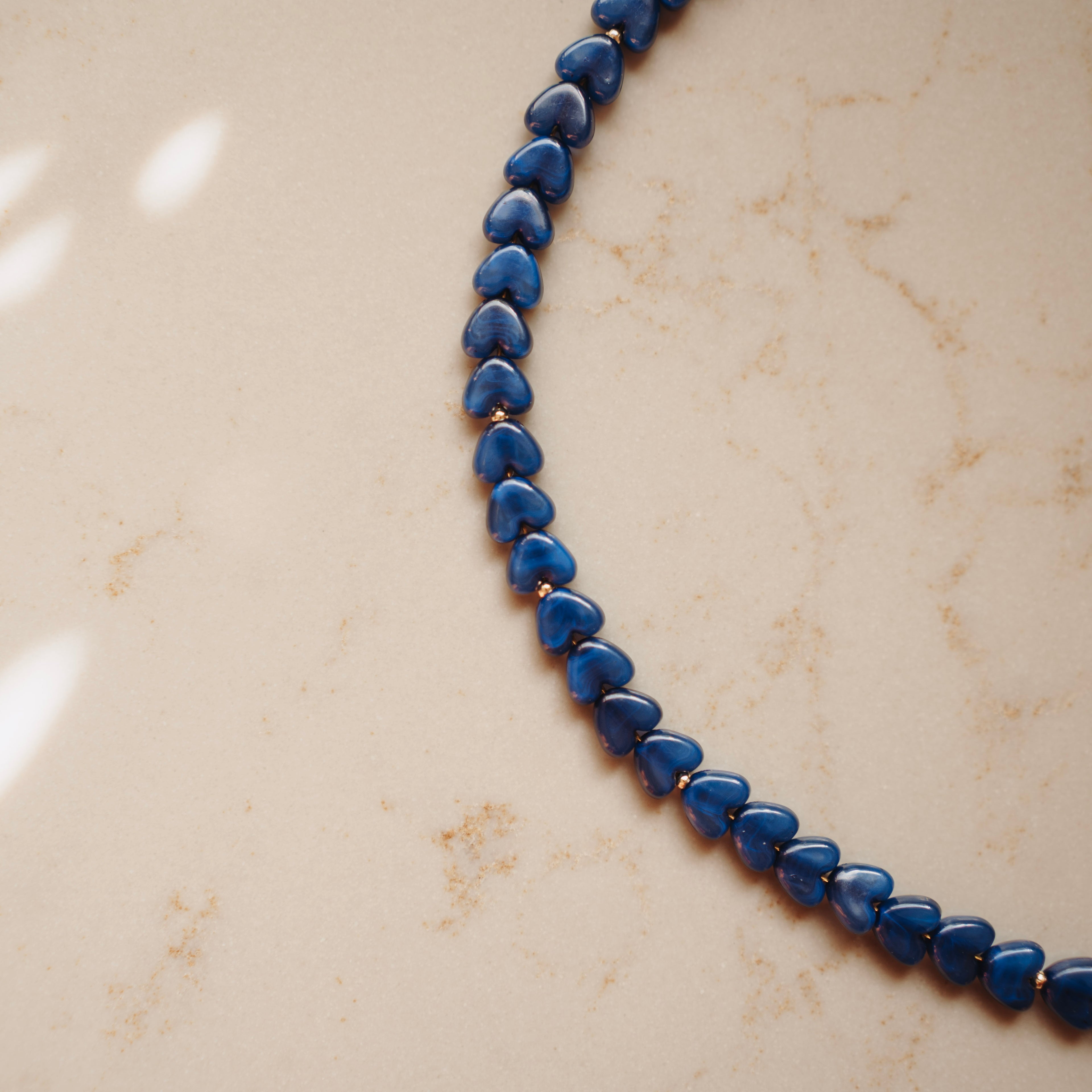 Collier Roos - hartjes blauw
