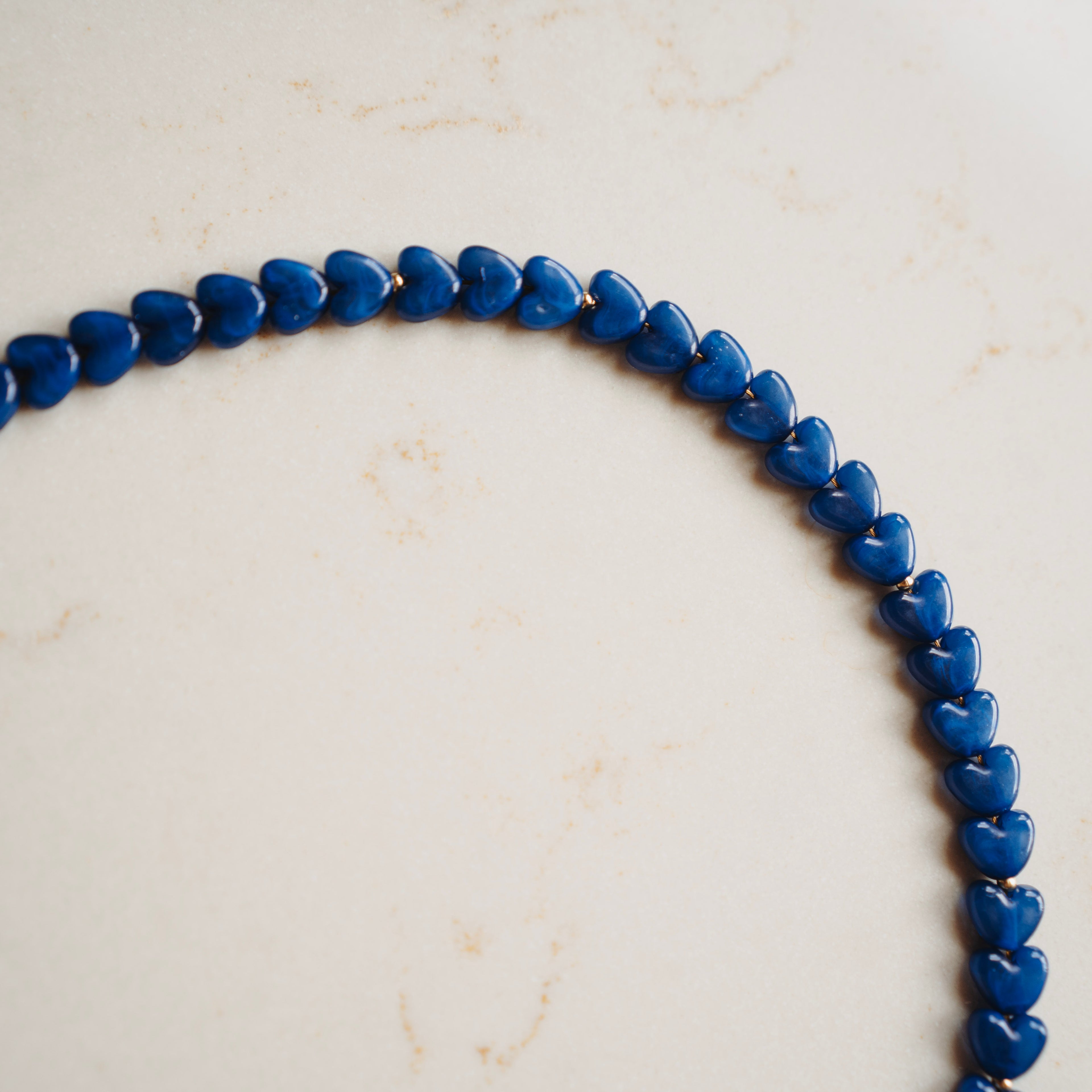Collier Roos - hartjes blauw