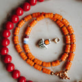 Collier Lexie - Oranje met tulp porcelein